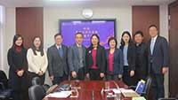 Representatives from CUHK and FDU pose a group photo